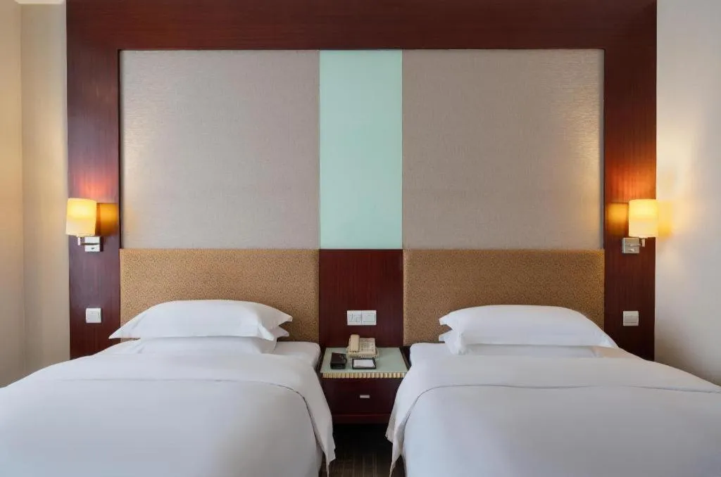 Bed in Golden Diamond Hotel Zhongshan