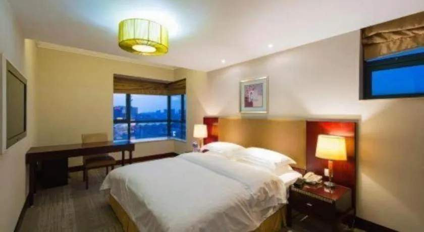Bed in Golden Diamond Hotel Zhongshan