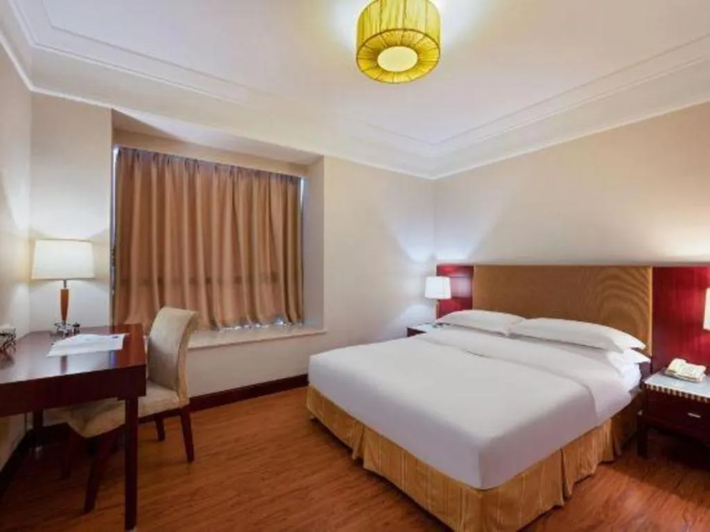 Bed in Golden Diamond Hotel Zhongshan