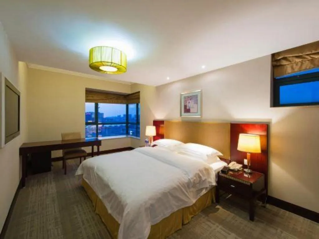 Bed in Golden Diamond Hotel Zhongshan