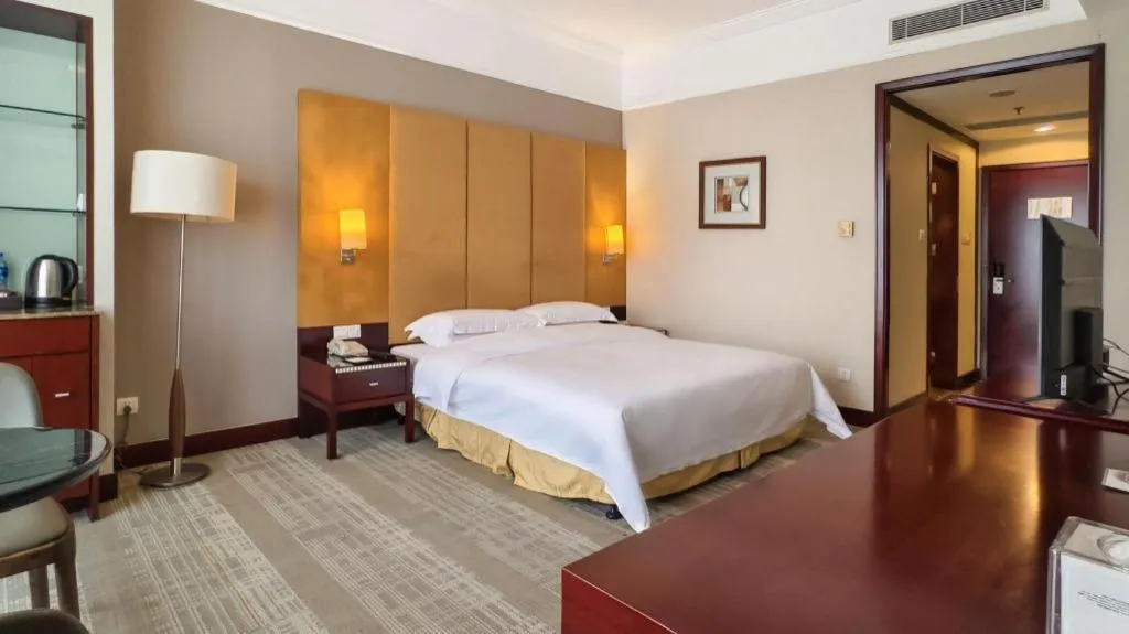 Bed in Golden Diamond Hotel Zhongshan