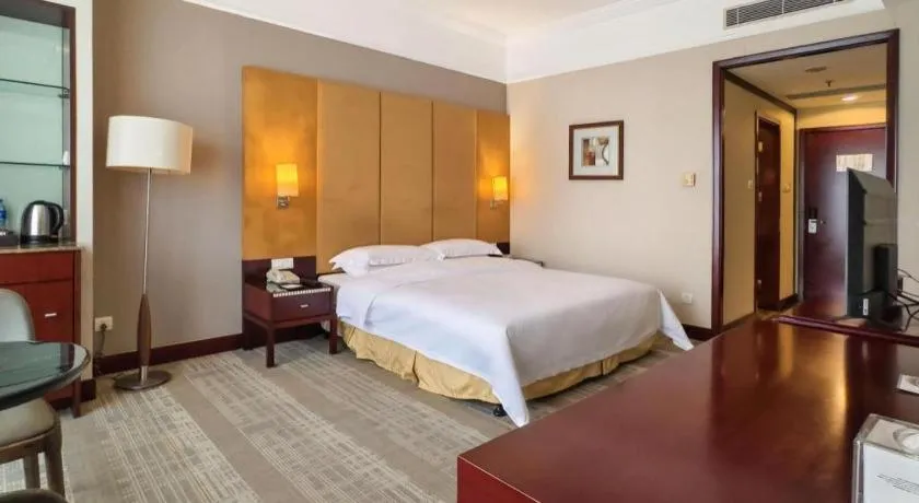 Bed in Golden Diamond Hotel Zhongshan