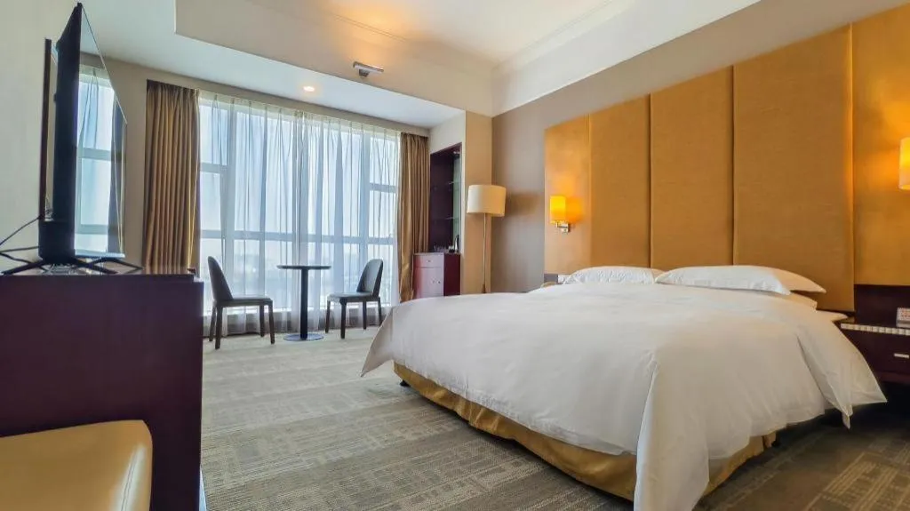 Bed in Golden Diamond Hotel Zhongshan