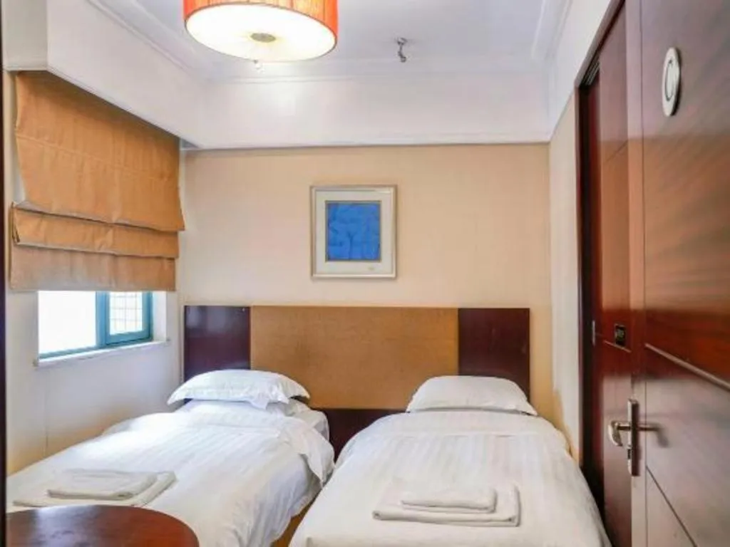Bed in Golden Diamond Hotel Zhongshan