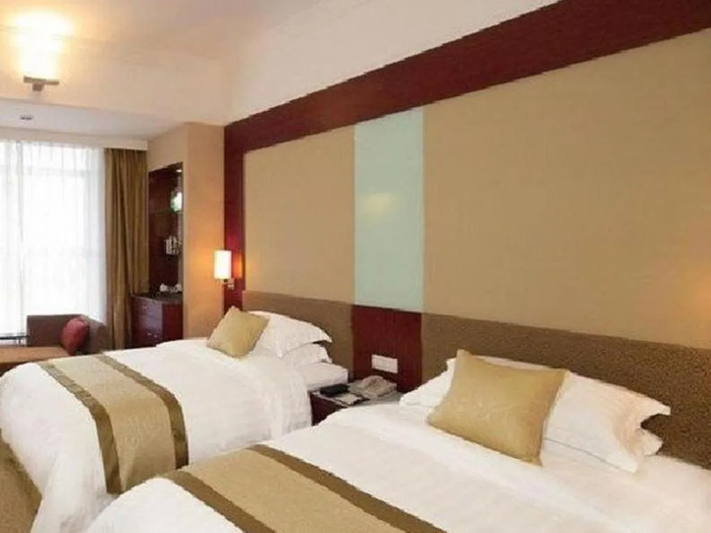 Bed in Golden Diamond Hotel Zhongshan