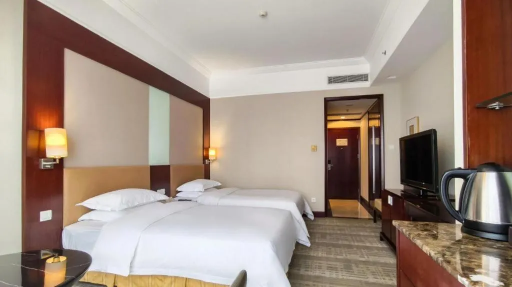 Bed in Golden Diamond Hotel Zhongshan