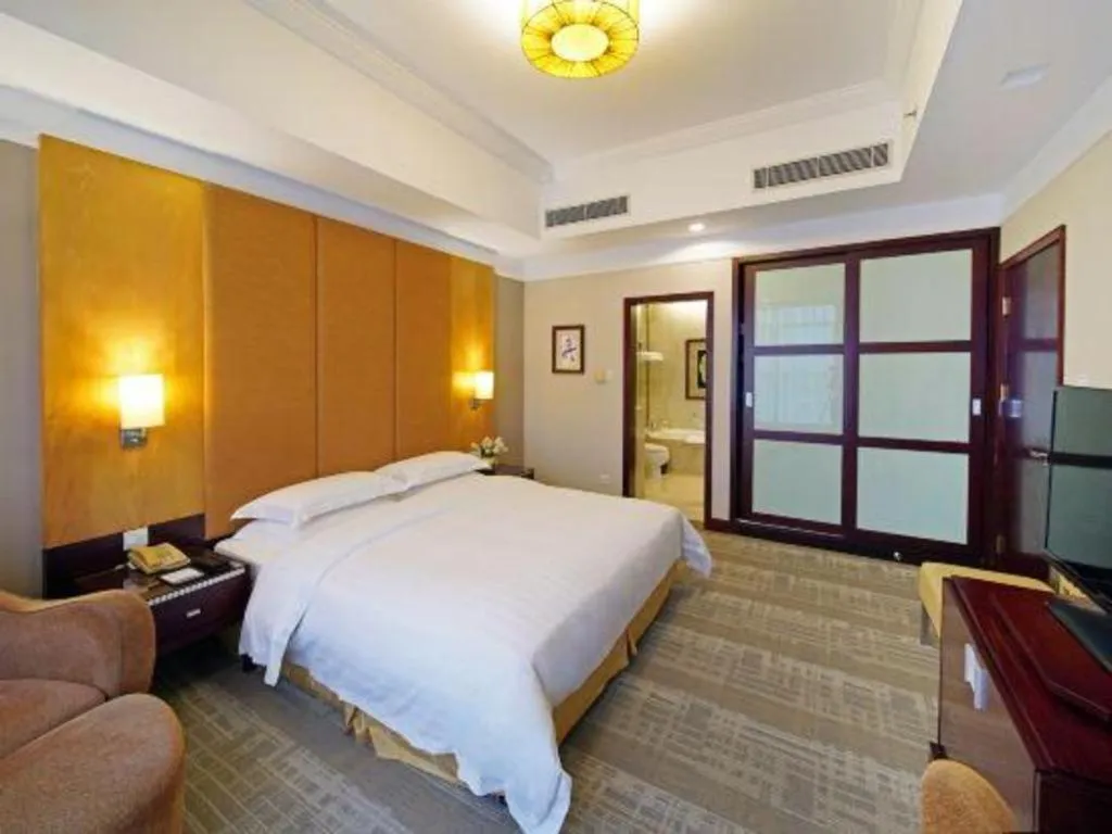 Bed in Golden Diamond Hotel Zhongshan