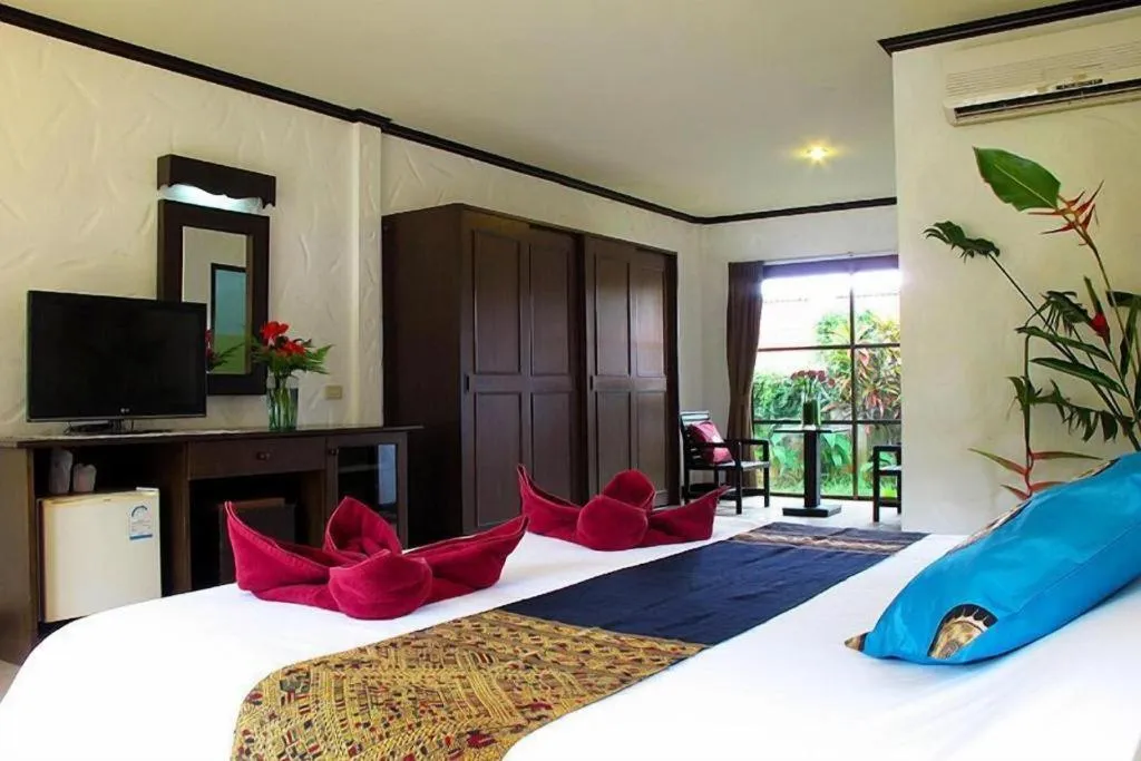 Bed in Khaolak Palm Hill Resort