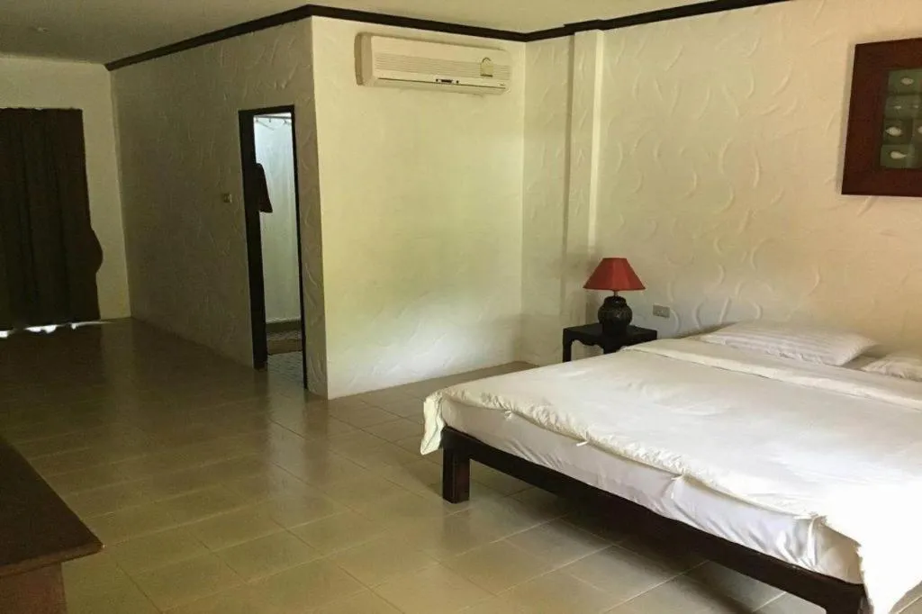 Bed in Khaolak Palm Hill Resort