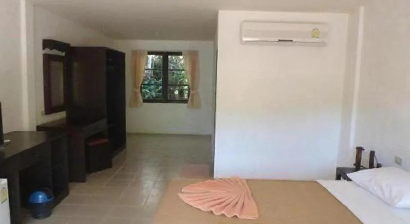 Bed in Khaolak Palm Hill Resort