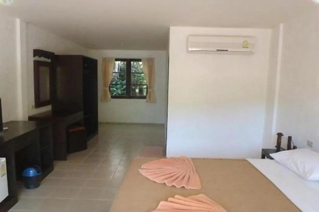 Bed in Khaolak Palm Hill Resort