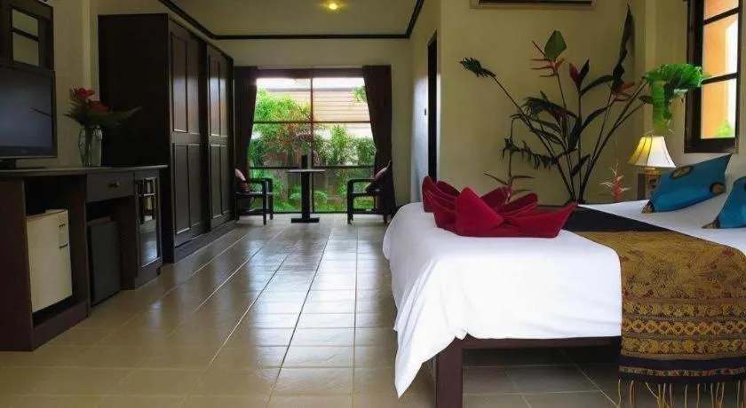 Bed in Khaolak Palm Hill Resort