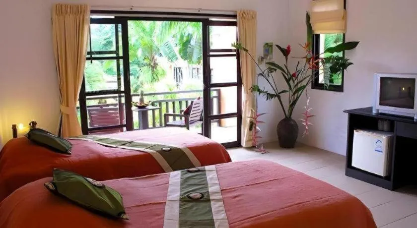 Bed in Khaolak Palm Hill Resort