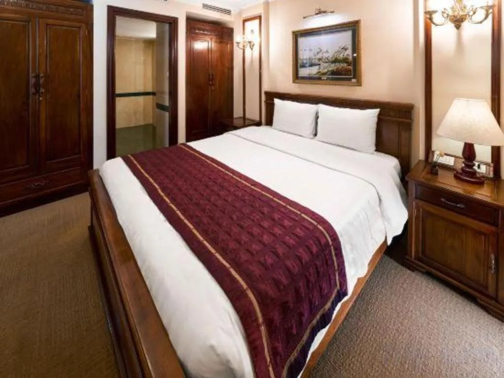 Bed in Eden Hotel Hanoi