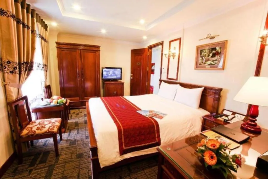 Bed in Eden Hotel Hanoi