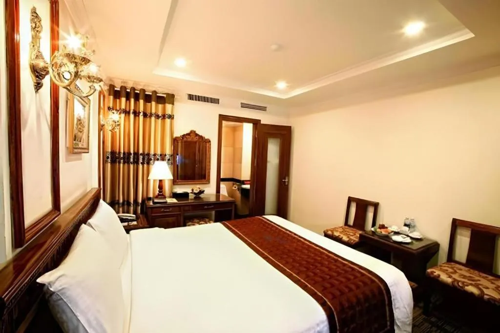 Bed in Eden Hotel Hanoi