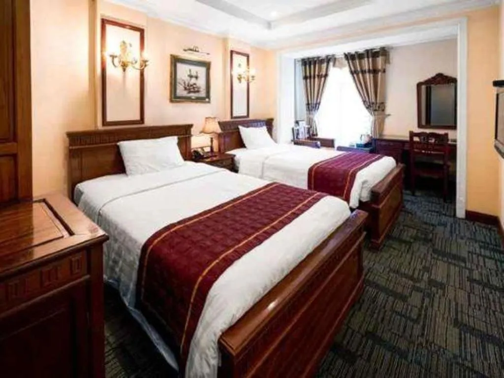 Bed in Eden Hotel Hanoi