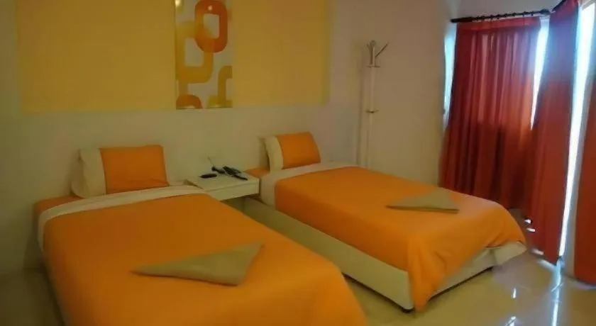 Bed in Nana Chat Bangsaen Hotel