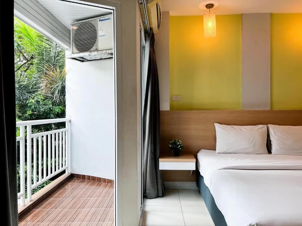 Bed in Nana Chat Bangsaen Hotel