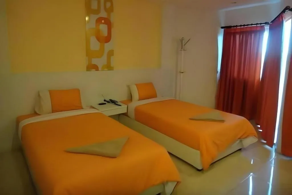 Bed in Nana Chat Bangsaen Hotel