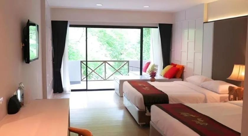 Bed in River Kwai Village Hotel
