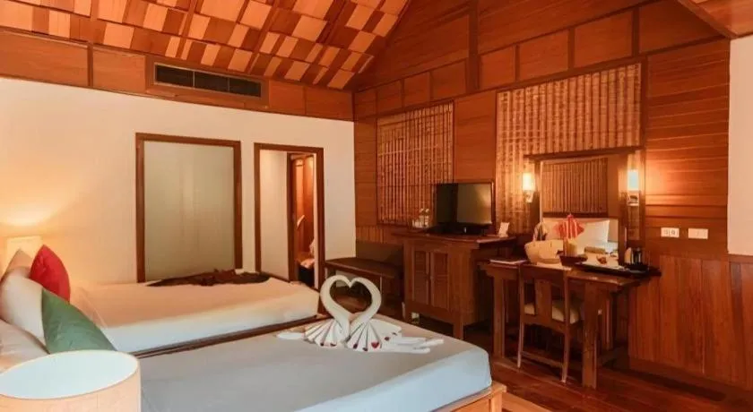 Bed in River Kwai Village Hotel