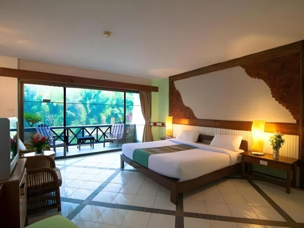 Bed in River Kwai Village Hotel