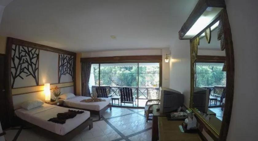 Bed in River Kwai Village Hotel