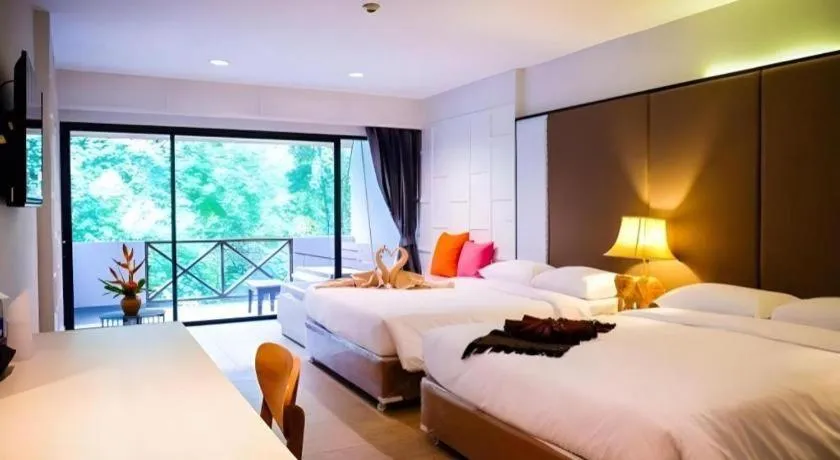 Bed in River Kwai Village Hotel