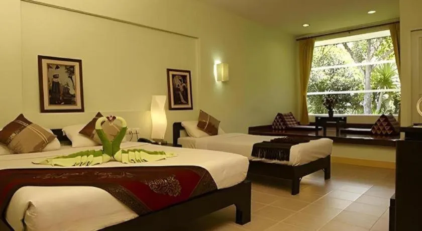 Bed in River Kwai Village Hotel