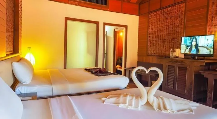 Bed in River Kwai Village Hotel