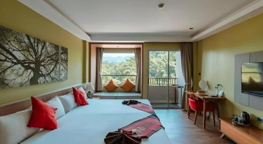 Bed in River Kwai Village Hotel