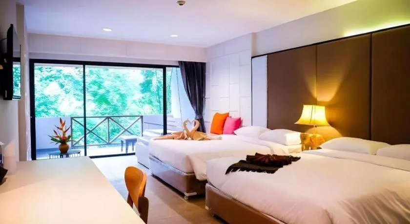 Bed in River Kwai Village Hotel