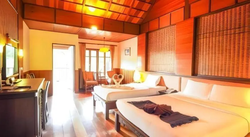 Bed in River Kwai Village Hotel