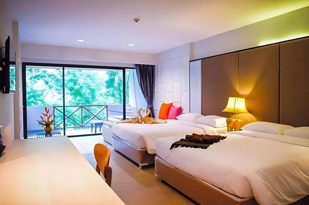 Bed in River Kwai Village Hotel