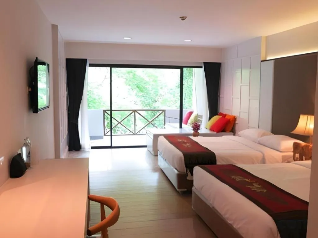 Bed in River Kwai Village Hotel
