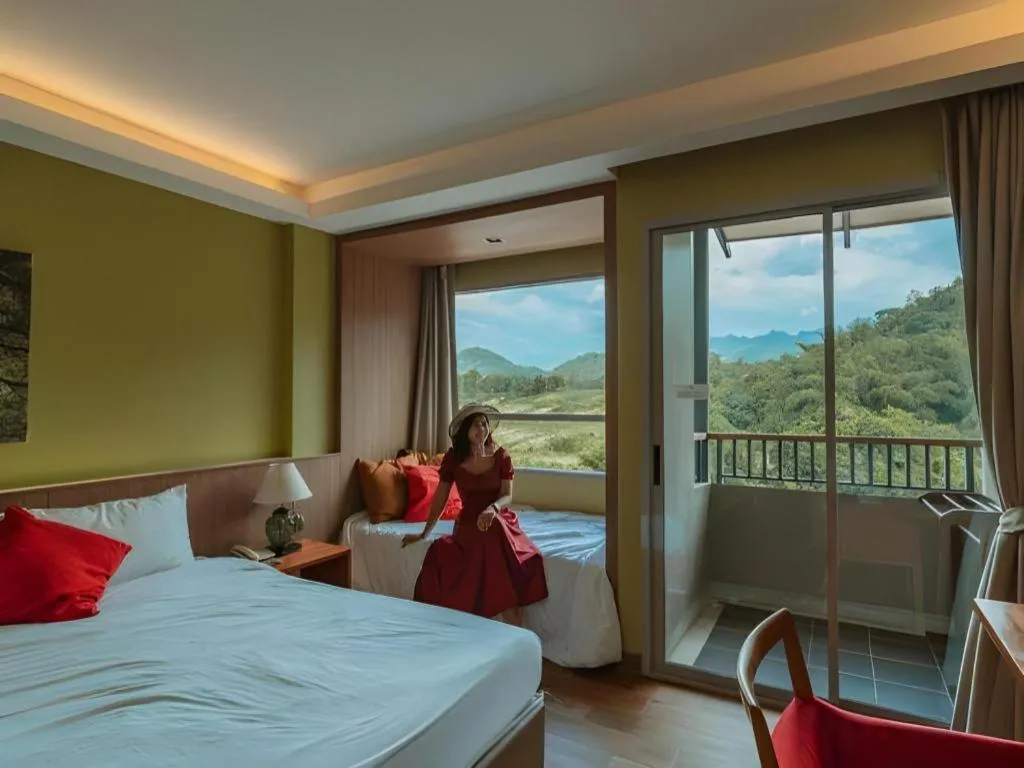 Bed in River Kwai Village Hotel