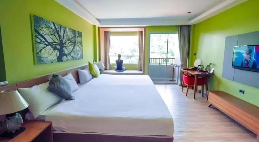 Bed in River Kwai Village Hotel