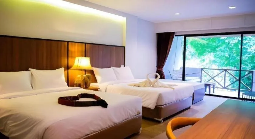 Bed in River Kwai Village Hotel