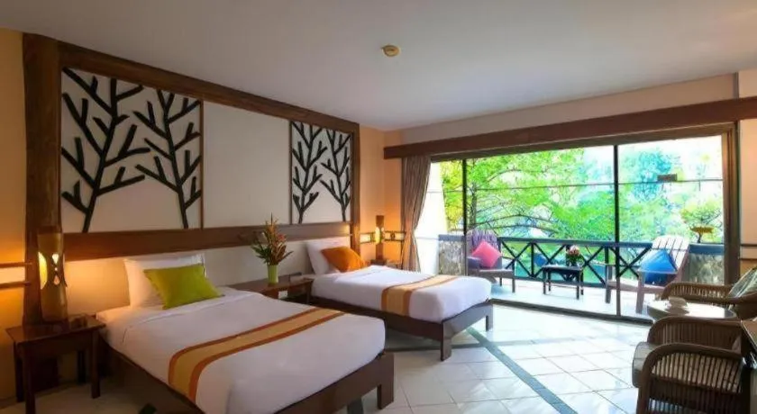 Bed in River Kwai Village Hotel