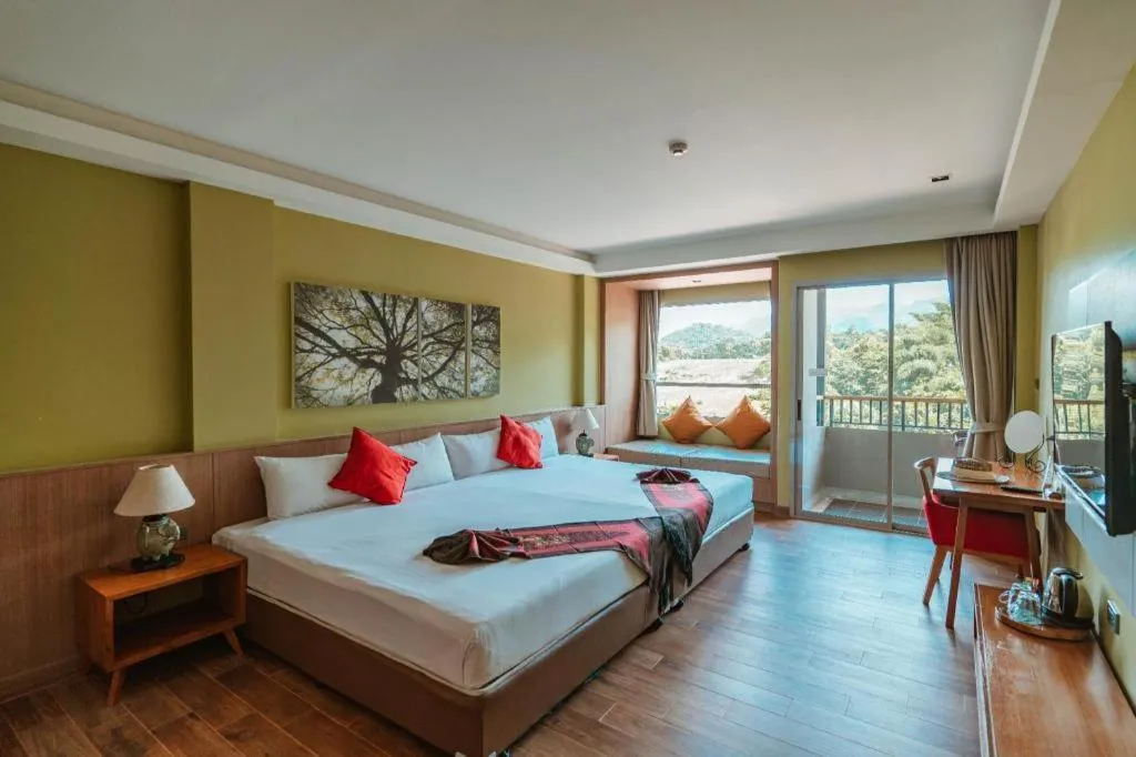 Bed in River Kwai Village Hotel