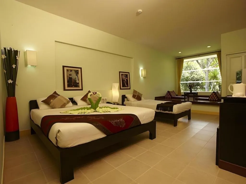 Bed in River Kwai Village Hotel