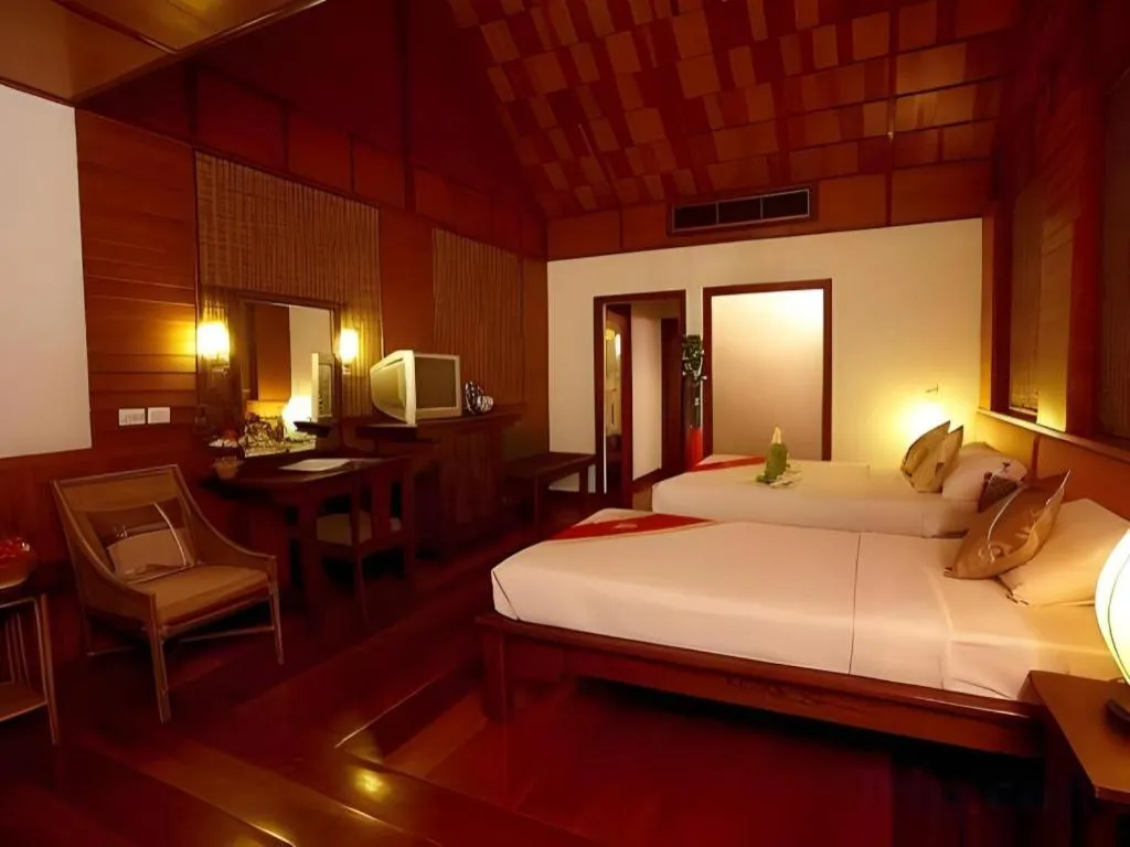 Bed in River Kwai Village Hotel