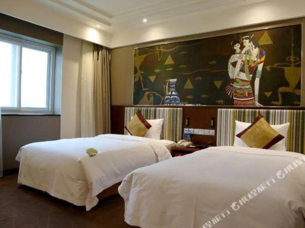 Bed in Grand Skylight Catic Hotel