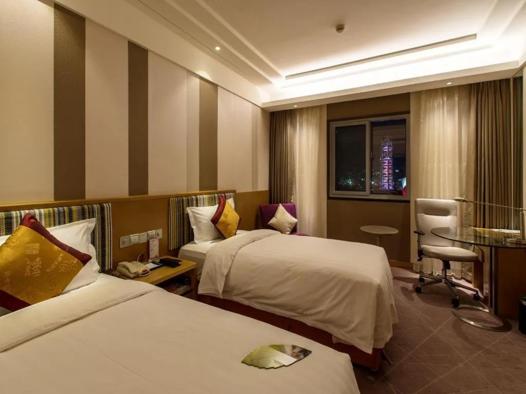 Bed in Grand Skylight Catic Hotel