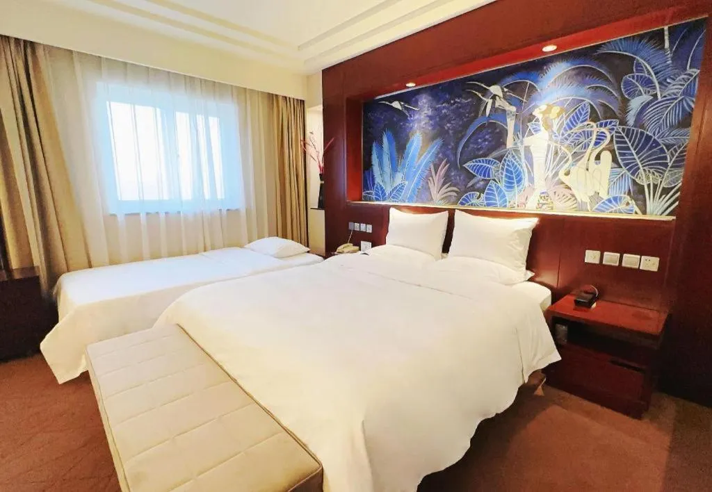 Bed in Grand Skylight Catic Hotel