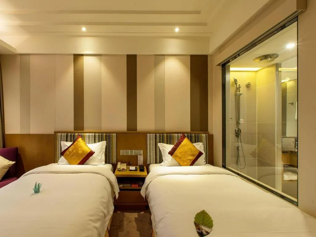 Bed in Grand Skylight Catic Hotel