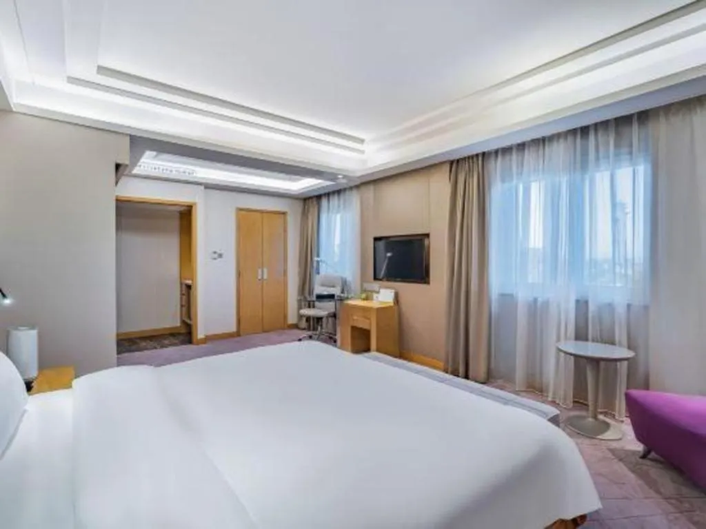 Bed in Grand Skylight Catic Hotel