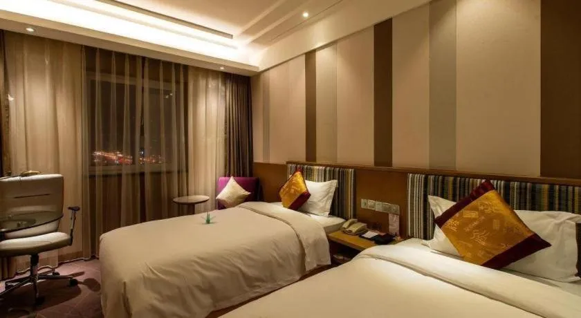 Bed in Grand Skylight Catic Hotel