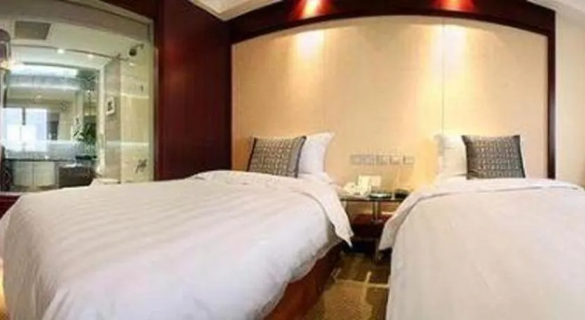 Bed in Grand Skylight Catic Hotel